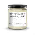 Candle jar with 'Maiden-Art' label on a white background