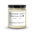 Maiden-Art candle with a label on a white background